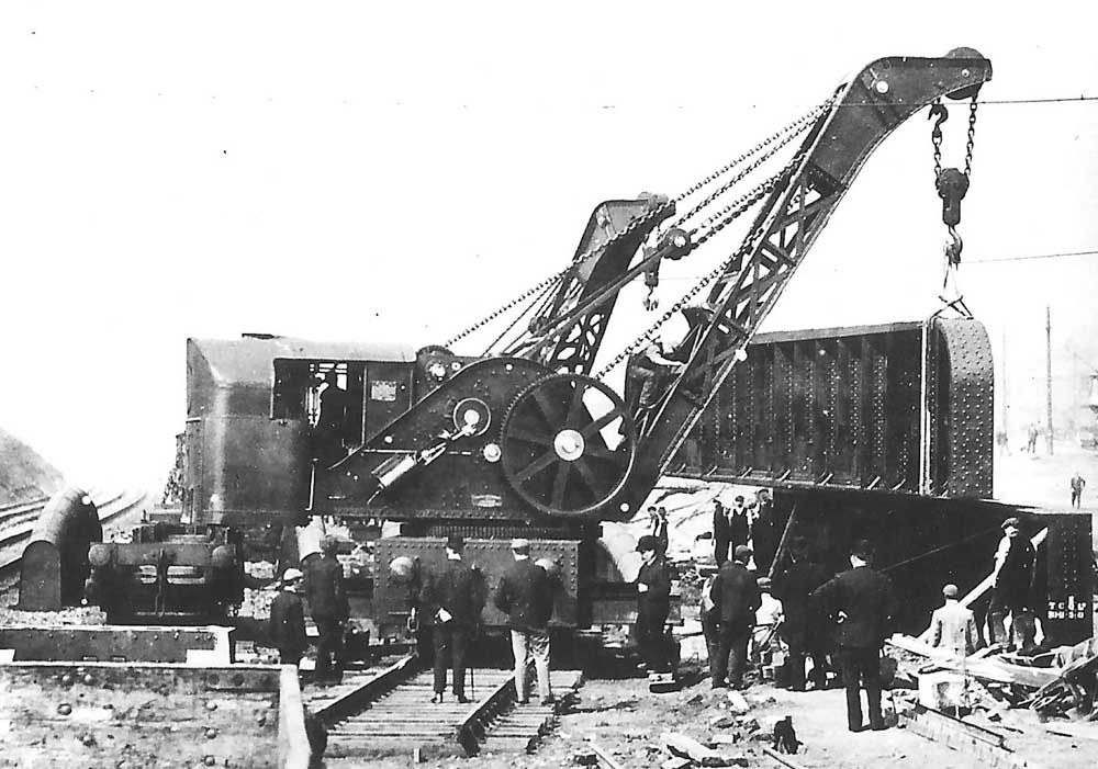 Close up showing the two GWR rail mounted cranes installing girders to a new bridge to the south of Small Heath Station
