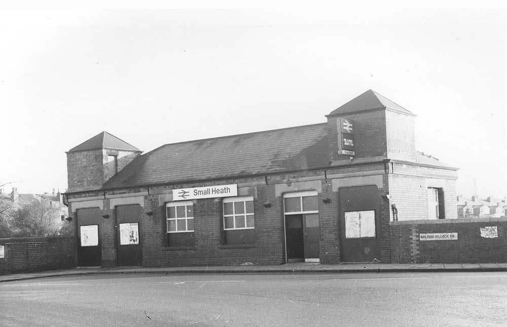 View of Small Heath station's booking office situated on the bridge of Golden Hillock Road with just one exterior door in use