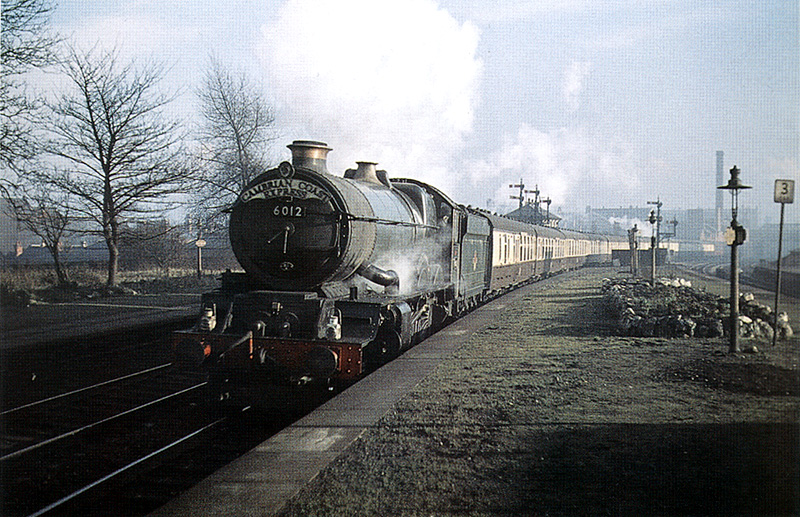 Ex-Great Western 4-6-0 No 6012 ‘King Edward VI’ of the 60XX King class steaming past Soho & Winson Green Station on the down main line