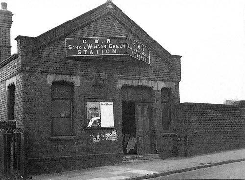The main station entrance and booking office above the up main line platform on the north side of Benson Road bridge