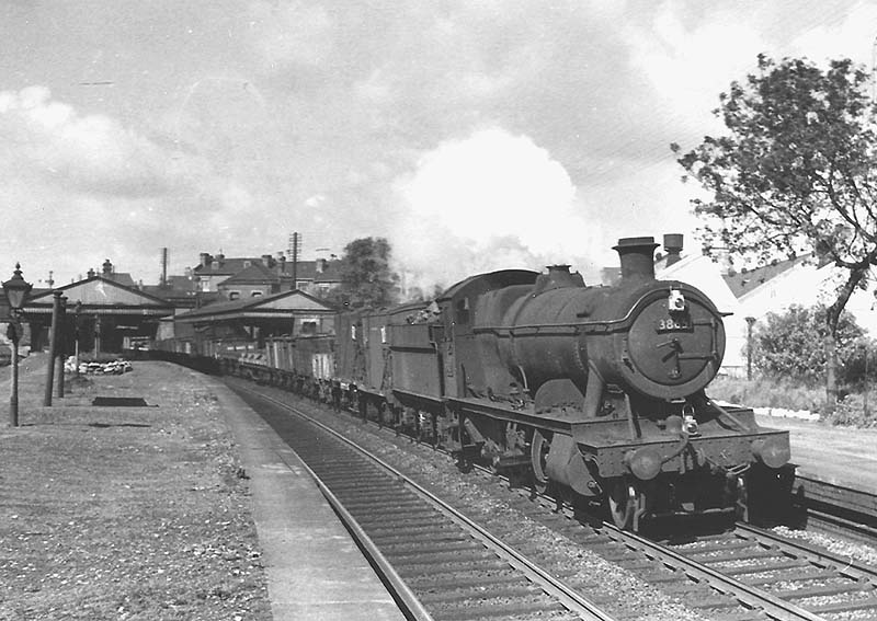 Ex-Great Western Railway 28xx class 2-8-0 No 3865 passes through Soho and Winson Green Station on the up main line