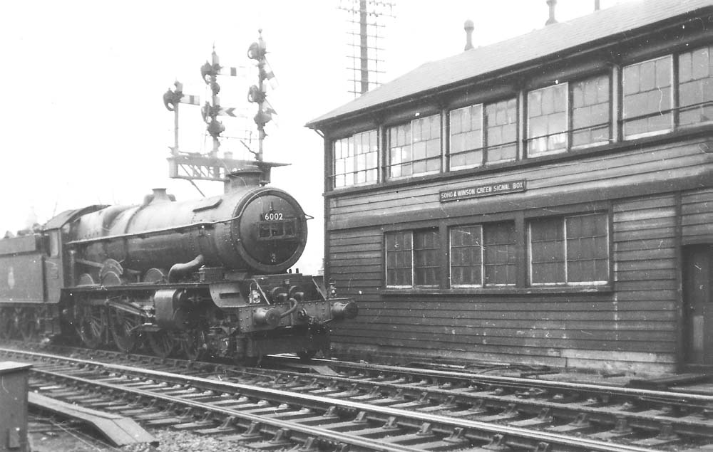 Ex-GWR 4-6-0 No 6002 �King William IV� has a clear route on the up main line into Birmingham on 21st March 1956