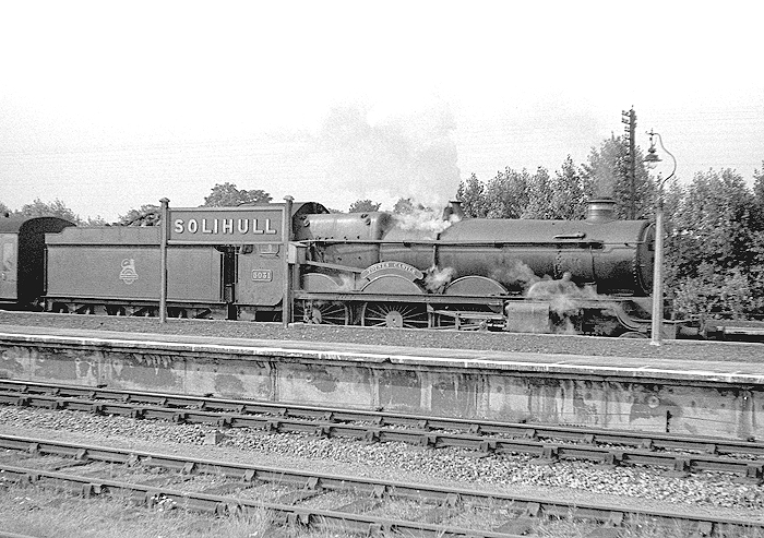 GWR 4-6-0 No 5031 'Totnes Castle' is seen standing at the head a train on the Down Main platform at Solihull