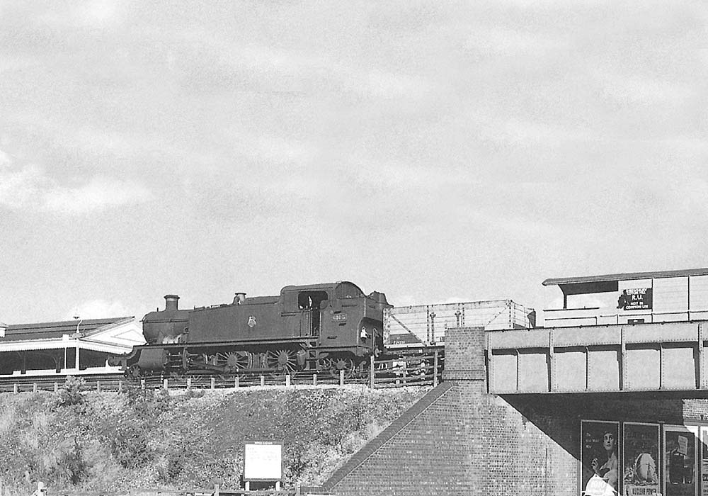 GWR 2-6-2T 61xx class No 6105 rests between duties on a short Permanent Way train at Solihull station