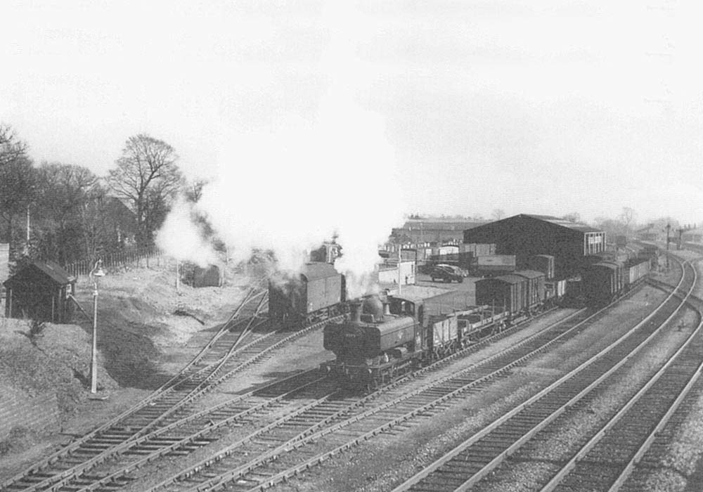 Ex-GWR 0-6-0PT No 9753 on what is thought to be the 10:15am Leamington to Tyseley goods service