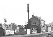 Close up showing the original signal box which was sited on the up platform and the very ornate lampposts