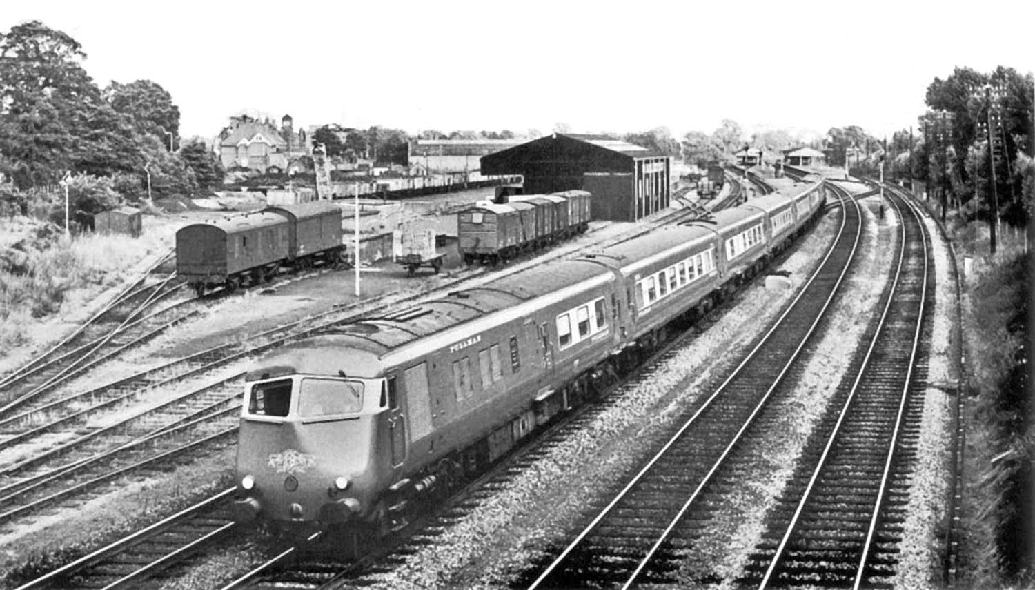 A down Birmingham Pullman service is seen passing Solihull station sometime in 1961