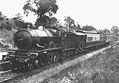 GWR 4-6-0 40xx 'Castle' class No 5011 'Tintagel Castle' is seen heading north from Southam Road station
