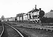 GWR outside framed 2-6-0 Aberdare class No 2608 is seen at the head of a long mineral goods train