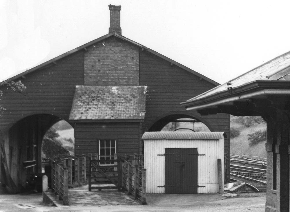 Close up showing the goods shed with access for road vehicles on the left and on the right for rail