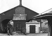 Close up showing the goods shed with access for road vehicles on the left and on the right for rail