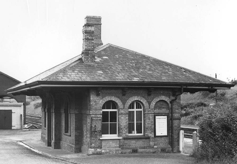Close up showing the main station building located between the down platform and the goods access road