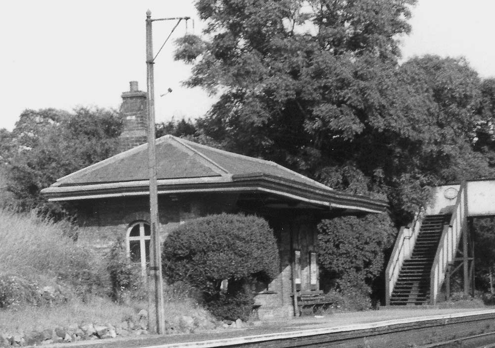 Close up showing the station's up platform substantial brick-built waiting room structure in more detail