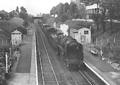 BR Standard 9F 2-10-0 No 92164 approaches Tyseley with an up Type 5 express freight service in 1964