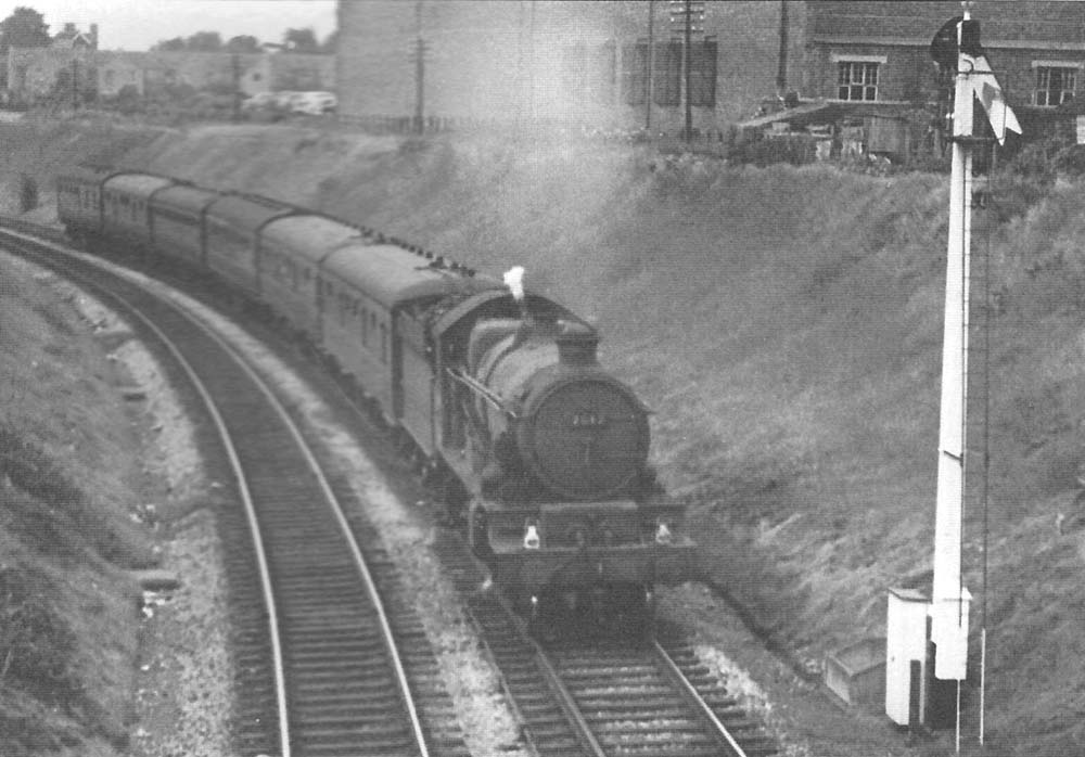 Ex-GWR 4-6-0 Castle Class No 7013 'Bristol Castle' approaches Spring Road Platform with a down service to West of England in 1964