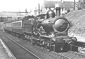 GWR Duke Class 4-4-0 No 3284 'Isle of Jersey' is seen on a three-coach express service on 9th May 1939