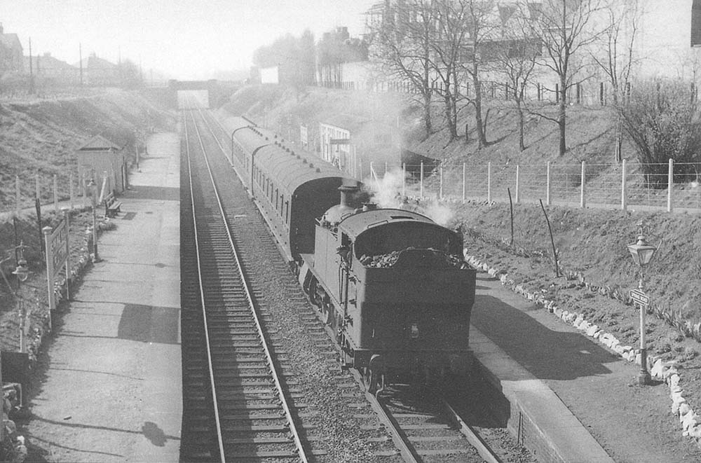 Ex-GWR 2-6-2T No 5176 stands at Spring Road Platform with the 10:02am Stratford upon Avon to Moor Street service on 22nd March 1957