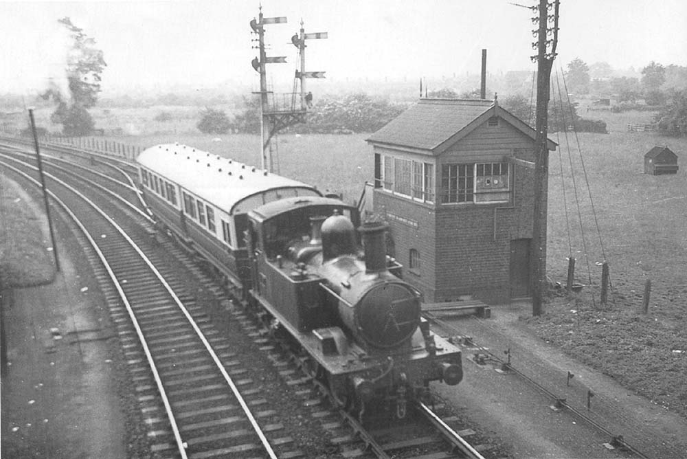 GWR 0-4-2T 14xx class No 4801 is seen operating as an auto service and about to pass under Alcester Road bridge to take forward the return 11:23 service