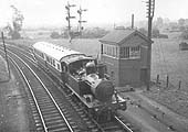 GWR 0-4-2T 14xx class No 4801 is seen on an auto service about to pass under Alcester Road bridge ready for its return to Alcester