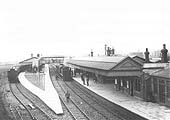 View looking northwards to Wilmecote showing the recently opened island platforms on the left and two trains standing in the station