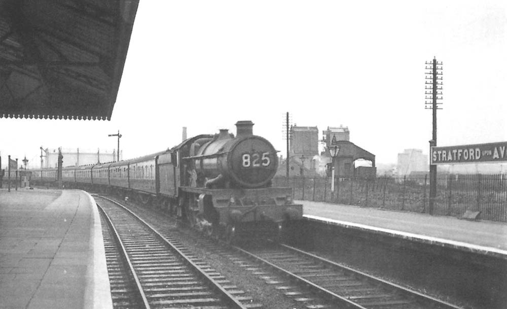 An unidentified ex-GWR 4-6-0 Castle class locomotive is seen arriving at Stratford on Avon at the head of the 9:15am Wolverhampton to Penzance