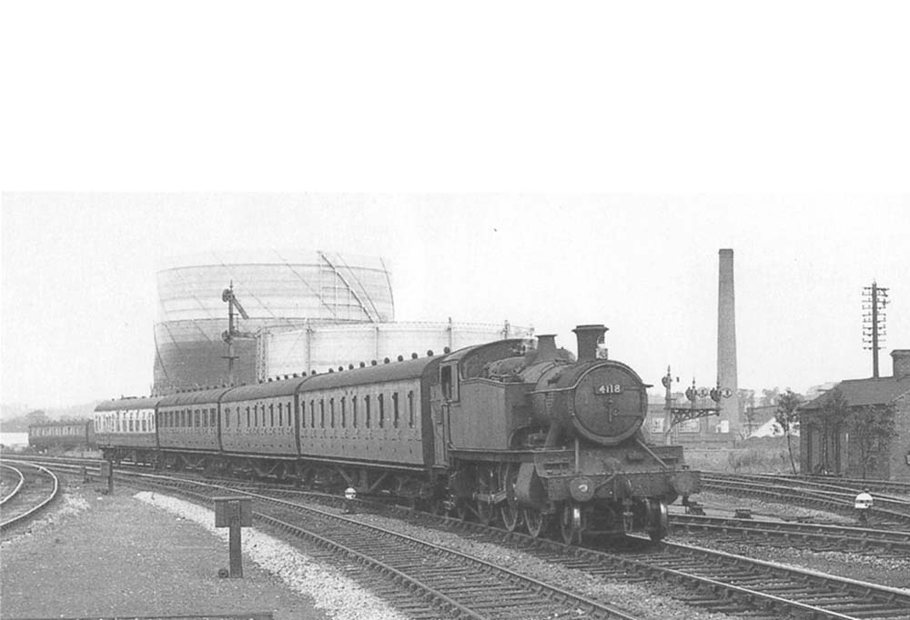 Ex-GWR 2-6-2T 'Large Prairie' No 4118, a member of the 51xx class, is seen arriving at Stratford on Avon with a four-coach local passenger service