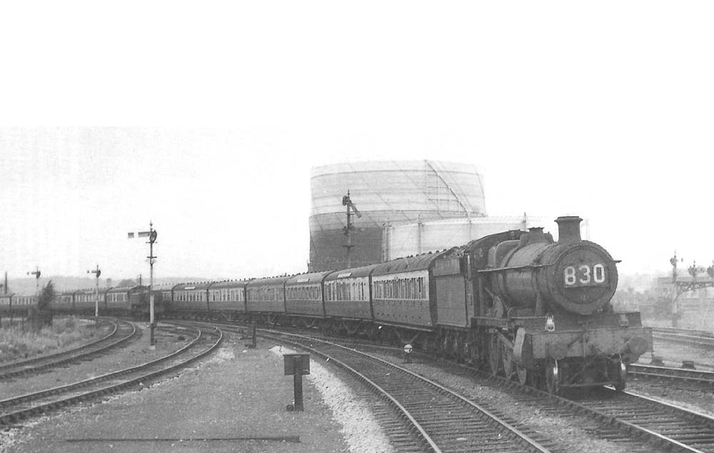 An unidentified ex-GWR 4-6-0 Grange class locomotive is seen approaching Stratford on Avon on the 10:50am Wolverhampton to Minehead and Ilfracombe service