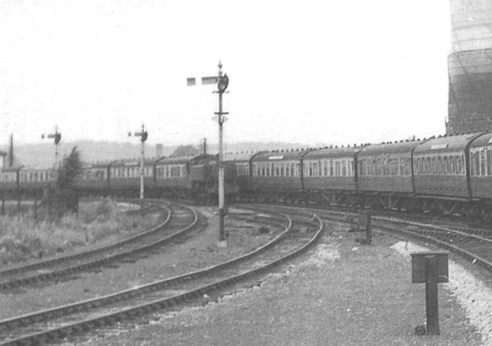 Close up showing an unidentified ex-GWR 0-6-0PT Pannier Tank standing at the junction with the Ministry of Food Cold Store siding