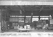 Looking towards  the parcels enclosure from the island platform with the parcels office on the left and refreshment room on the right