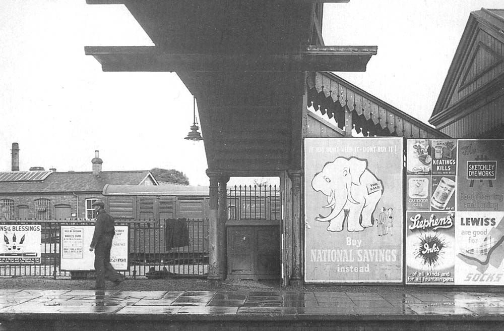 View showing the passenger footbridge and steps leading down to the down platform with the horse dock adjacent to the livestock market behind