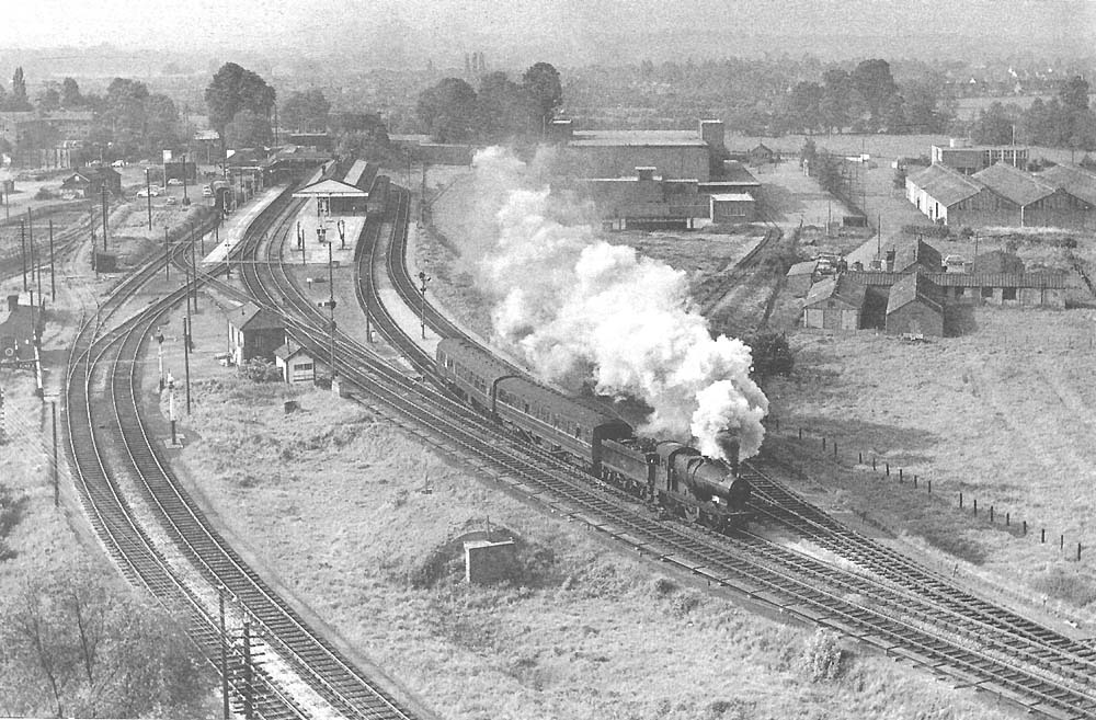 Stratford-upon-Avon Station in June 1964 with ex Great Western Railway 0-6-0 2251 class No 2211 departing on the 8:43am local to Leamington