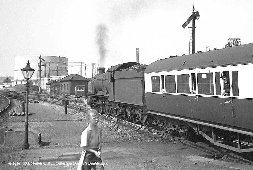 Unidentified 49xx (Hall) class locomotive on a Wolverhampton to West Country express leaves Stratford-on-Avon