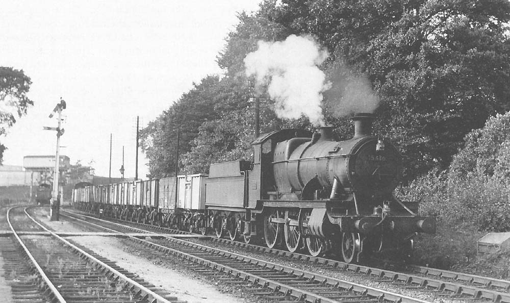 Ex-GWR 2-6-0 No 5336, on a down evening goods train, passes Shottery footpath on 20th August 1959
