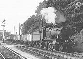 Ex-GWR 2-6-0 No 5336, on a down evening goods train, passes Shottery footpath on 20th August 1959