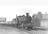 Ex-GWR 2-6-0 No 9314 is seen with a down freight passing Stratford on Avon shed on 29th April 1958