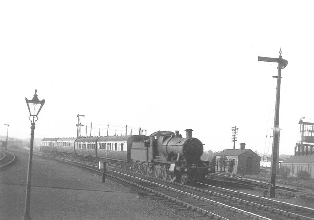 GWR 2-6-0 No 4397 is held by signals whilst at head of a Snow Hill to Stratford on Avon local train on 21st May 1935