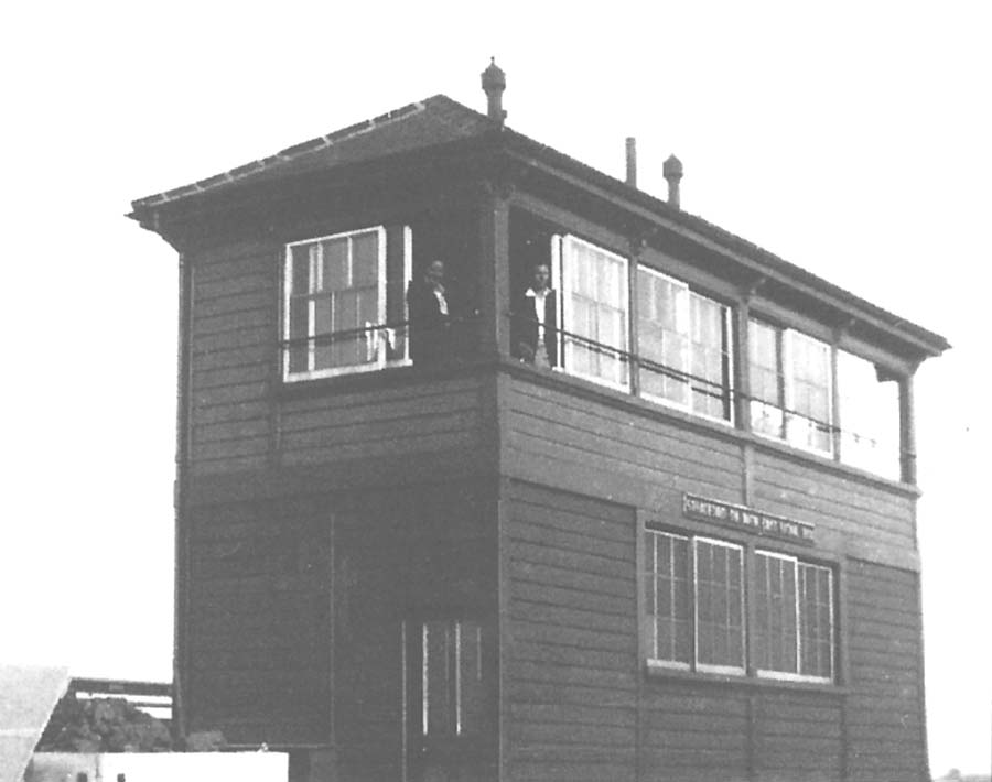 The local signalman poses at the window of the then new Stratford on Avon East Signal Box seen in August 1933