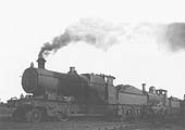 GWR 2-6-0 Aberdare class No 2633 is pulling 'dead' GWR 2-4-0 Barnum class No 3225 on 17th April 1935