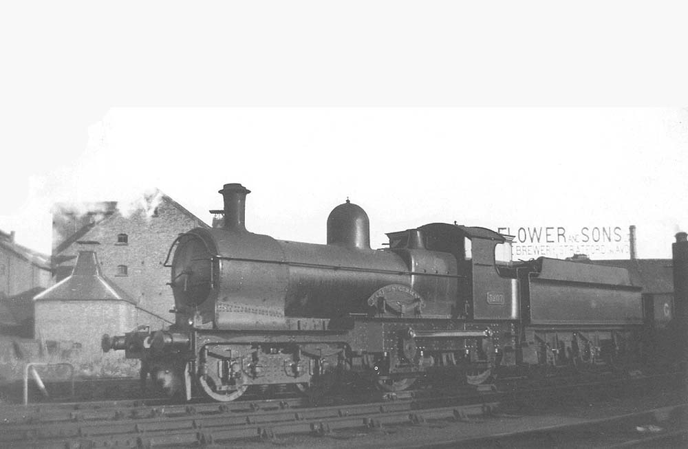 GWR 4-4-0 Earl class class No 3207 'Earl of St Germans' shunts coal wagons at Birmingham Road goods yard on 29th December 1936