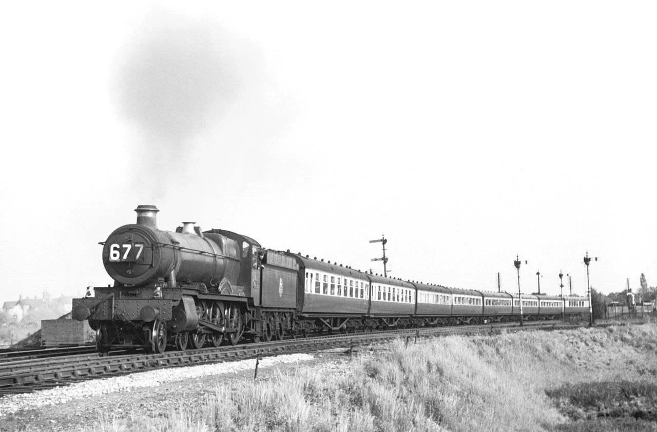 Ex-GWR 4-6-0 No 6811 'Cranbourne Grange' leaving the confines of Stratford upon Avon on 1st June 1957