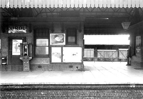 Looking across from the down platform to the two island platforms and beyond to the Ministry of Food's Cold Store 1942 built depot