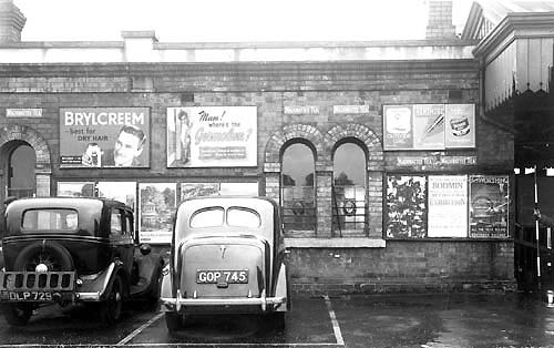 View of a portion of the exterior of Stratford on Avon station to the left of the gated entrance to the down platform