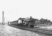 Ex-Great Western Railway 4-6-0 4073 Castle class No 5073 'Blenheim' passes Stratford Racecourse on 19th June 1959 with a Class D  partially fitted freight