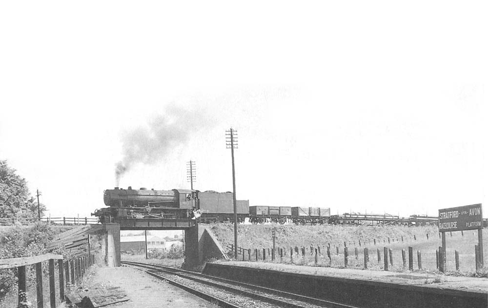 Ex-WD 2-8-0 No 90312 is seen crossing over the former GWR line as it proceeds to Broom on a engineer's train on 28th May 1960