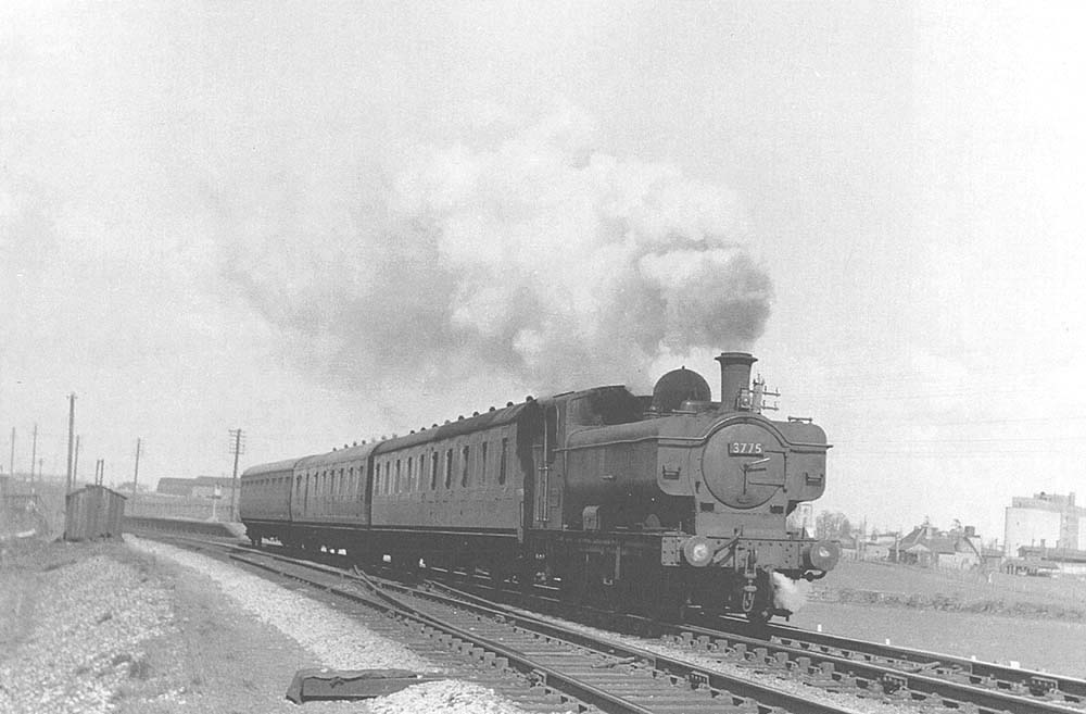 Ex-GWR 0-6-0PT No 3775 heads the 1:47pm Stratford on Avon to Evesham local passenger service on 11th April 1958