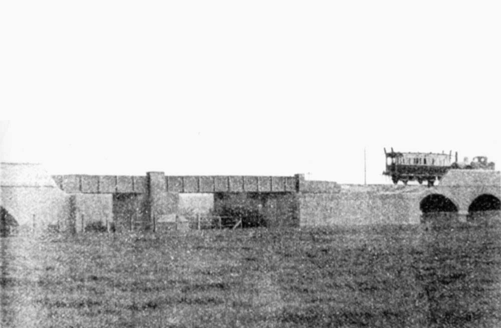 View of the GWR inspection coach and an unknown 0-4-2T travelling over the line south of Stratford upon Avon prior to the opening of the line