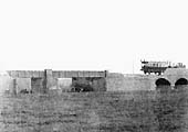 View of the GWR inspection coach and an unknown 0-4-2T travelling over the line south of Stratford prior to the opening of the line
