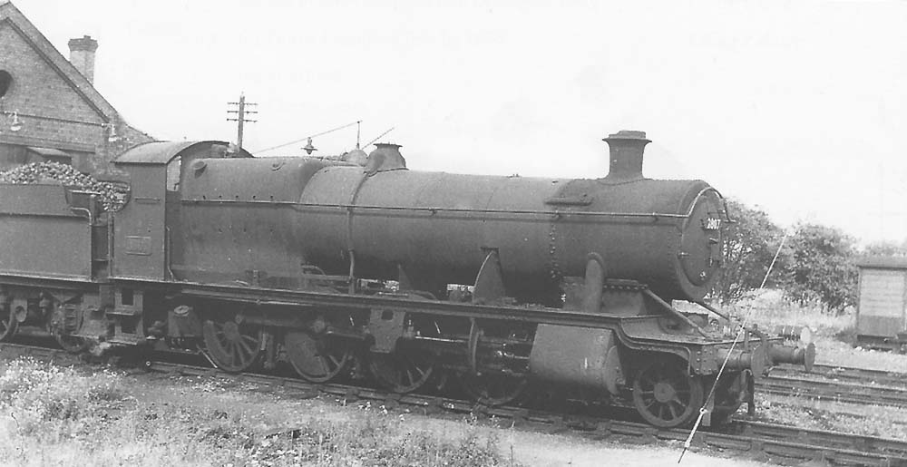 Ex-GWR 2-8-0 No 2807 stands fully coaled and watered outside Stratford on Avon shed shed in July 1960