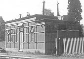 Close up of the closed station building which shows on the left the booking office and on the right the waiting room