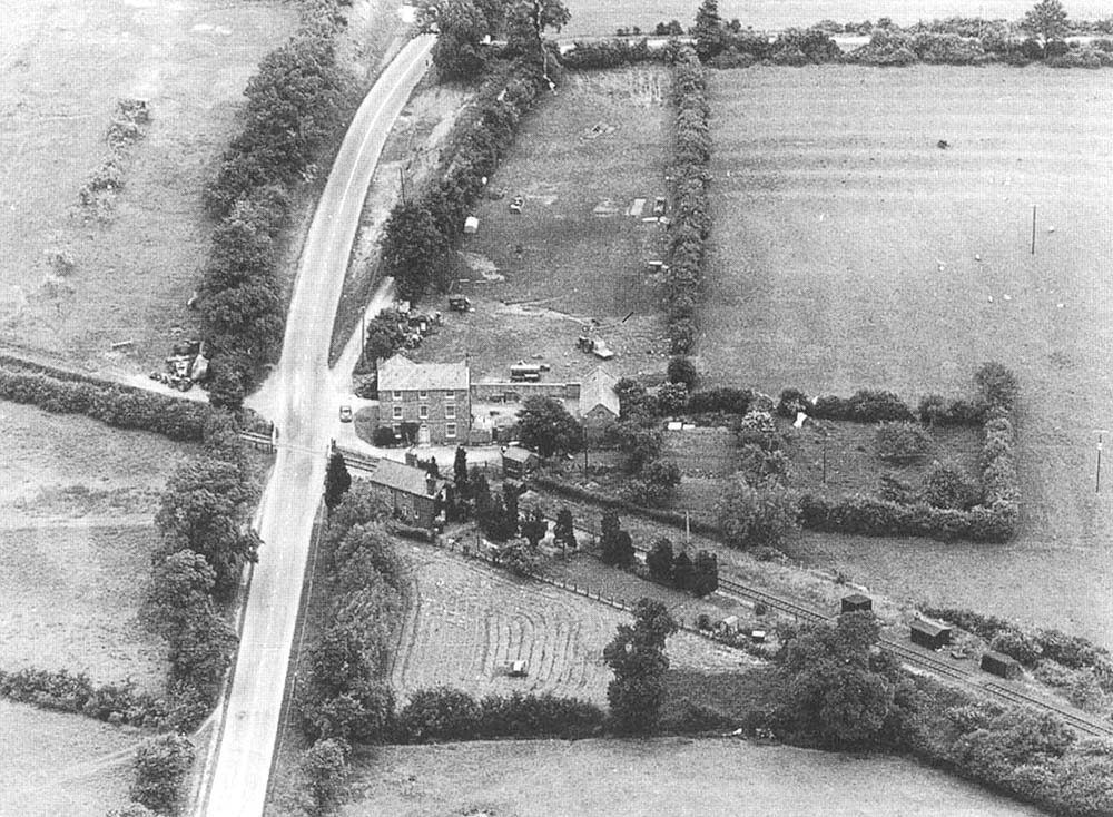 An aerial view of the station after the passenger services had ceased and the goods siding lifted